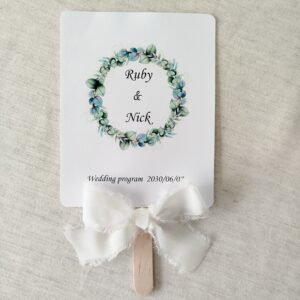 Exquisite Greenery Wreath Wedding Fan Template, 6.7x5.3 inches, with botanical foliage surrounding personalized names and a modern timeline.