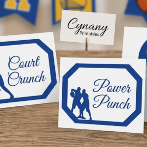 Amazing Golden City basketball food tents displayed on a party table with sports themed snacks and blue napkins